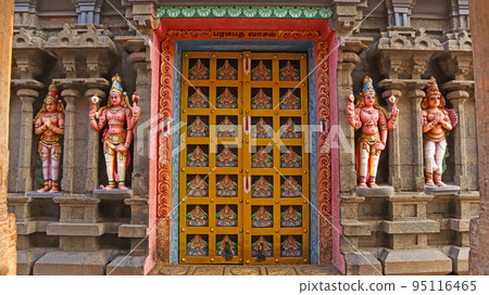 Colorful Door and Sculptures of Hindu God and Goddess on the Paramapadha Vasal, Sri Ranganathaswamy Temple, Srirangam, Trichy, Tamil Nadu, India 95116465