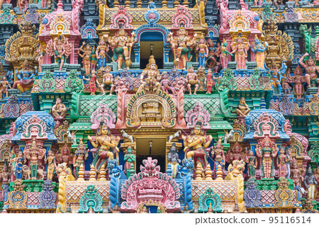 Colorful Sculptures of Hindu God and Goddess on the Gopuram of Sri Ranganatha Swamy Temple, Srirangam, Trichy, Tamilnadu, India. Colorful Sculptures of Hindu God and Goddess on the Gopuram of Sri Ranganatha Swamy Temple, Srirangam, Trichy, Tamilnadu, India. 95116514