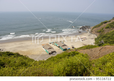 Chapora Beach and shacks aerial view, near Chapora Fort, North Goa, India.. 95116722