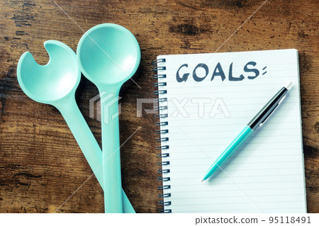 Food Goals, Plan for better cooking, eating, and diet. A notepad Food Goals, Plan for better cooking, eating, and diet. A notepad 95118491