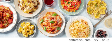 Pasta panorama. Assortment of Italian pastas, with spaghetti in tomato sauce etc Pasta panorama. Assortment of Italian pastas, with spaghetti in tomato sauce etc 95118496