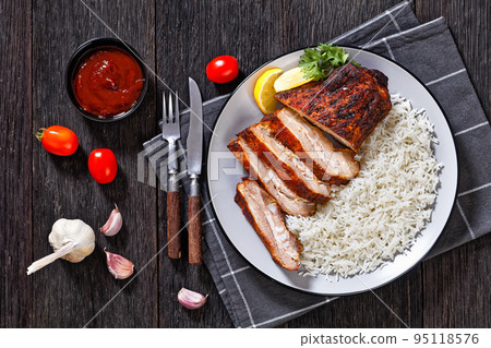roast baby back pork meaty ribs with basmati rice 95118576