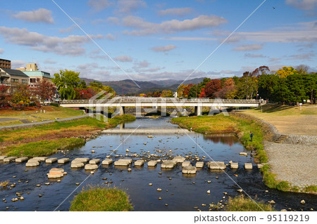 Demachi Bridge in autumn seen from Kamo Bridge 95119219
