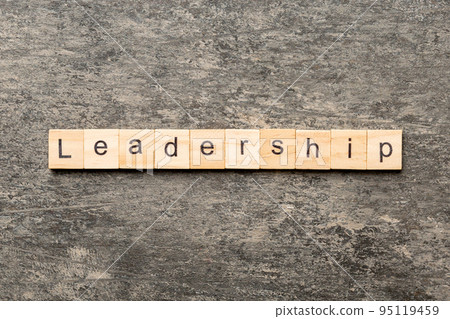 LEADERSHIP word written on wood block. LEADERSHIP text on table, concept LEADERSHIP word written on wood block. LEADERSHIP text on table, concept 95119459
