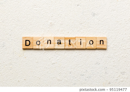 donation word written on wood block. donation text on table, concept 95119477