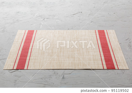 Perspective view of red tablecloth for food on cement background. Empty space for your design 95119502