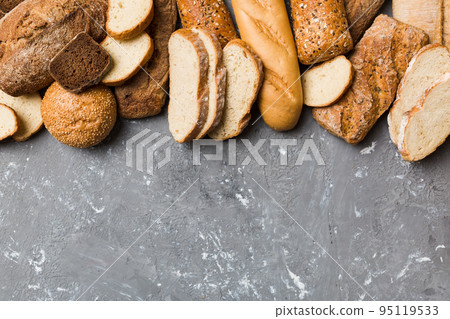 Homemade natural breads. Different kinds of fresh bread as background, top view with copy space 95119533