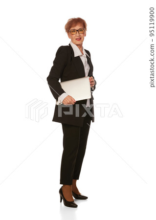 Portrait of confident senior executive manager. Stylish middle age woman in black business suit posing isolated on white background 95119900