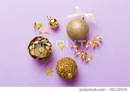 Christmas ball on colored background. decoration bauble with ribbon bow with copy space 95119929