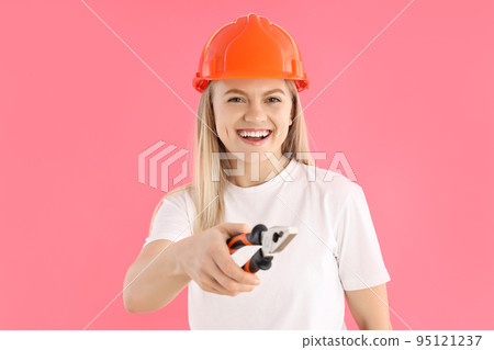 Concept of professions, young woman on pink background 95121237