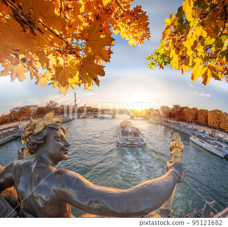 Alexandre III bridge in Paris against Eiffel Tower with autumn leaves, France 95121682