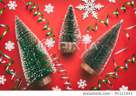 Flat lay composition with christmas trees on color background. Top view with copy space 95121841