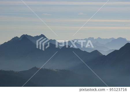 Outlines of Mount Brienzer Rothorn and other mountains seen from Mount Niederhorn, Switzerland. 95123716