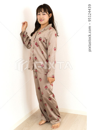 A young woman in pajamas A young woman in pajamas 95124439