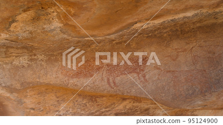 Cave paintings and petroglyphs in Amojjar Cave in mauritania 95124900