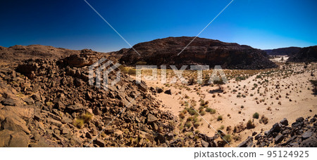 Aerial panoramic view to El Berdj mountain and erg gorge in Tassili nAjjer national park, Algeria 95124925