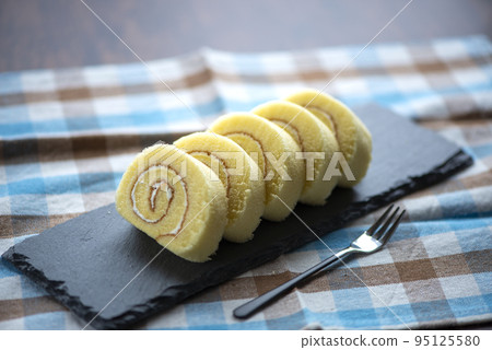 roll cake on slate plate roll cake on slate plate 95125580