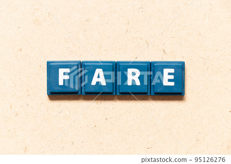 Tile letter in english word fare on wood background Tile letter in english word fare on wood background 95126276