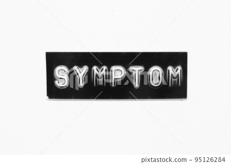 Black color banner that have embossed letter with word symptom on white paper background 95126284