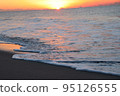 sunrise and waves 95126555