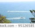The moment the yachts pass each other on the sea 95126585