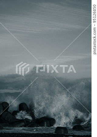 Shimizu, Shizuoka Explosion of rough waves hitting a tetrapod on the coast of Orito 95126850