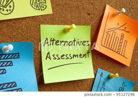 Sticker with Alternatives assessment memo on the wall. Sticker with Alternatives assessment memo on the wall. 95127296