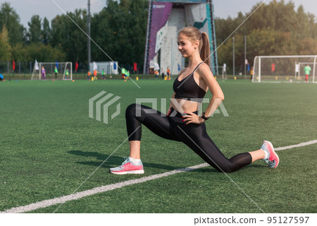 Young woman athlete runnner is exercising 95127597