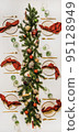 Flat-lay of festive Christmas table setting with 95128949