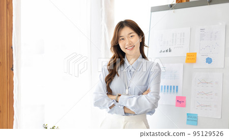 Office worker with a beautiful Asian woman in a private office, Daily routine of office workers, Welcome to work in the morning with a bright smile, Businesswoman in office concept. Office worker with a beautiful Asian woman in a private office, Daily routine of office workers, Welcome to work in the morning with a bright smile, Businesswoman in office concept. 95129526