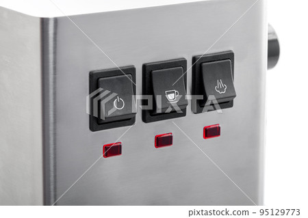 Black buttons for control making coffee with white icons, close-up of the panel with buttons and red indicators for gray steel espresso coffee machine. Black buttons for control making coffee with white icons, close-up of the panel with buttons and red indicators for gray steel espresso coffee machine. 95129773