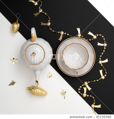 New Year's photo. Kettle and cup on the festive 95130366