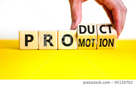 Product and promotion symbol. Concept words Product and promotion on wooden cubes. Businessman hand. Beautiful yellow table white background. Business product and promotion concept. Copy space. Product and promotion symbol. Concept words Product and promotion on wooden cubes. Businessman hand. Beautiful yellow table white background. Business product and promotion concept. Copy space. 95130702