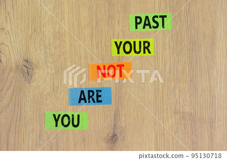 You are not your past symbol. Concept words You are not your past on colored paper. Beautiful wooden background. Business and you are not your past concept. Copy space. You are not your past symbol. Concept words You are not your past on colored paper. Beautiful wooden background. Business and you are not your past concept. Copy space. 95130718