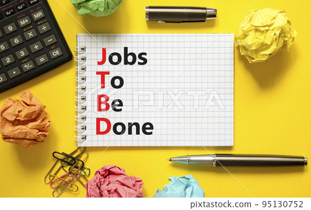 JTBD jobs to be done symbol. Concept words JTBD jobs to be done on white note on beautiful yellow background. Black calculator and pen. Business and JTBD jobs to be done concept. Copy space. JTBD jobs to be done symbol. Concept words JTBD jobs to be done on white note on beautiful yellow background. Black calculator and pen. Business and JTBD jobs to be done concept. Copy space. 95130752