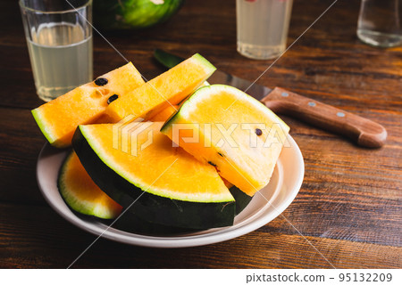 Sliced Yellow Watermelon Sliced Yellow Watermelon 95132209