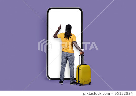 Back view of black man tourist using big smartphone, mockup 95132884