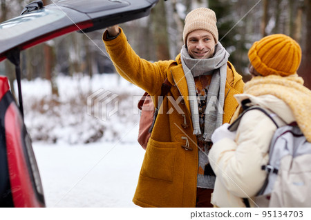 Couple Travelling By Car in Winter Couple Travelling By Car in Winter 95134703