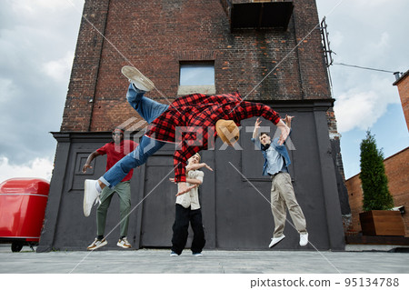 Male Breakdance Crew doing Stunts Male Breakdance Crew doing Stunts 95134788