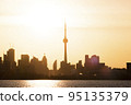 Toronto s skyline at dusk as seen from Centre Island 95135379