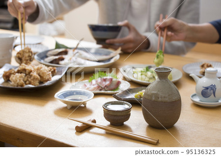 Dining table for drinking at home, drinking sake at dinner, Japanese meals Dining table for drinking at home, drinking sake at dinner, Japanese meals 95136325