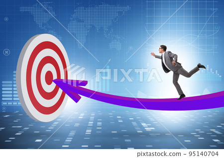 Businessman aiming for the success Businessman aiming for the success 95140704