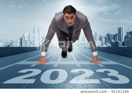 Businessman running to new 2023 year 95141268