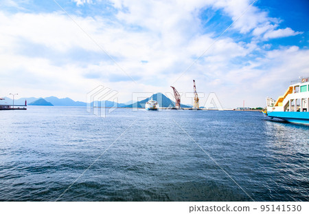 It is the ferry departure and arrival pier scenery of Hiroshima Port. Akiko Mt.Fuji on Ninoshima Island can be seen in front of you. Hiroshima It is the ferry departure and arrival pier scenery of Hiroshima Port. Akiko Mt.Fuji on Ninoshima Island can be seen in front of you. Hiroshima 95141530