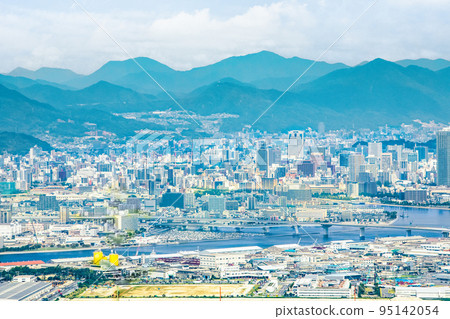 This is a view of the center of Hiroshima city from the summit of an island in the Seto Inland Sea. It is a landscape centered on Kamiyacho. Hiroshima 95142054