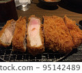 Freshly fried delicious crispy juicy tonkatsu 95142489