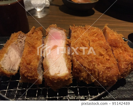 Freshly fried delicious crispy juicy tonkatsu 95142489