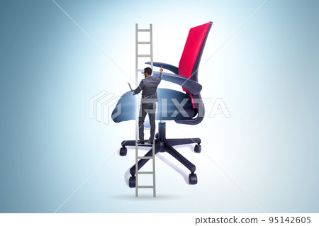 Businessman in the career concept climbing chair 95142605