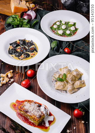 cooked different ravioli and lasagna on wood cooked different ravioli and lasagna on wood 95143550