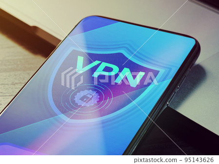 VPN - Virtual private network application for encrypt connection, anonymous internet using and unblock websites. Close up vpn security network sign logo on the smartphone screen  95143626